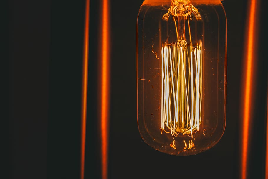 shallow focus photography of light bulb, close-up photo of yellow light bulb HD wallpaper