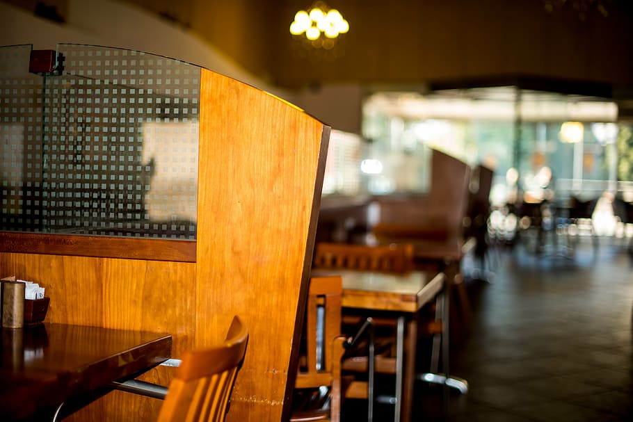 selective focus photography of brown wooden table near wall HD wallpaper