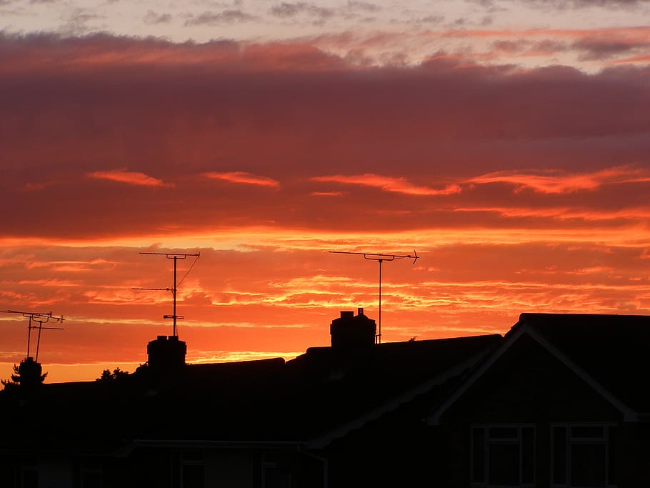 sunset, silhouettes, rooftops, sky, landscape, scenic, evening HD wallpaper