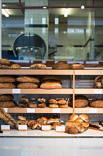 bunch of baked breads on wooden shelf, bakery, shop, window HD wallpaper