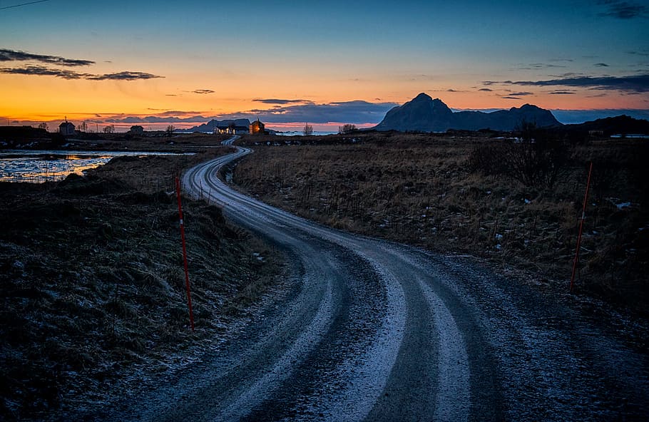 landscape of road beside ocean, empty gray and brown road during dawn HD wallpaper