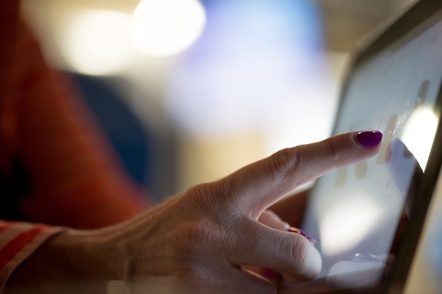 selective focus photography of person pointing at tablet computer, person touch monjiot HD wallpaper
