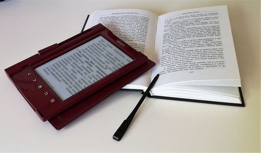 brown e-book reader on opened book, books, ebook, change, communication HD wallpaper