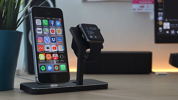 space gray iPhone 5s beside black aluminum case Apple Watch with black Sport Band HD wallpaper