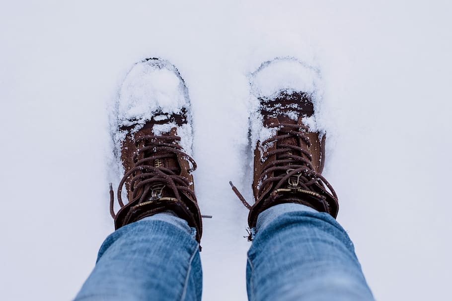 person wearing brown leather boots converted by snow, person standing on white snow wearing brown boots HD wallpaper