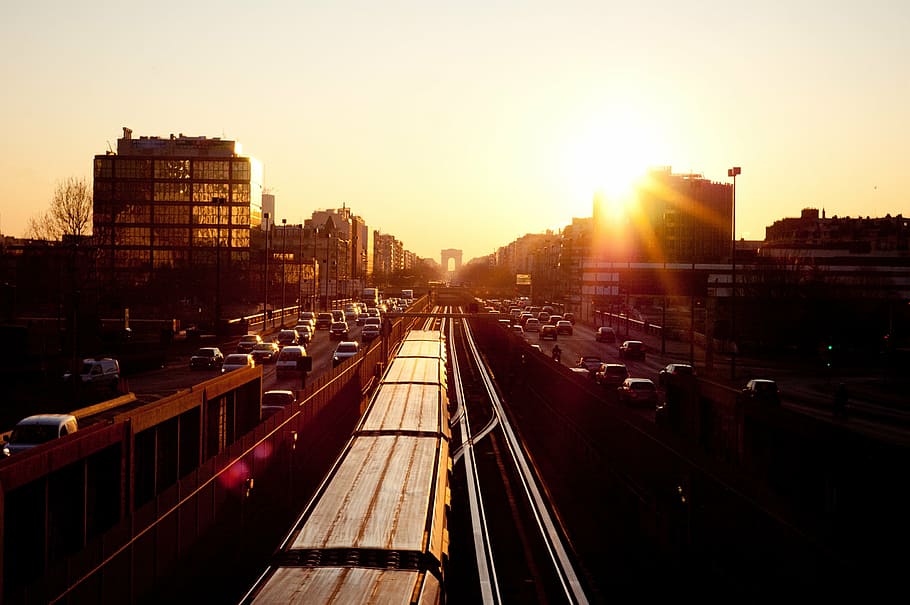 road during sunset, aerial, photo, full, cars, sky, buildings HD wallpaper