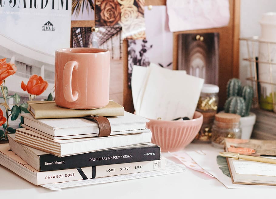 brown ceramic coffee mug on book, pink ceramic mug on five books, HD wallpaper