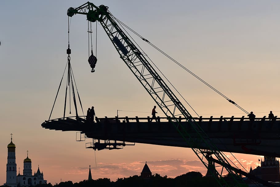 silhouette of person walking beside crane, construction, working HD wallpaper