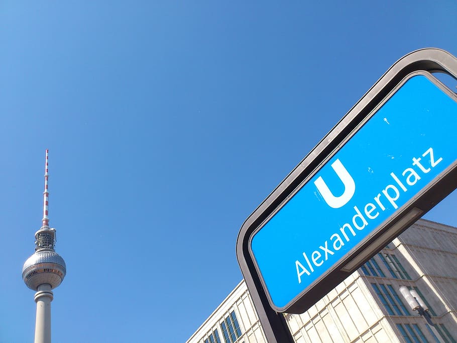 low-angle photography of Alexanderplatz signage during daytime