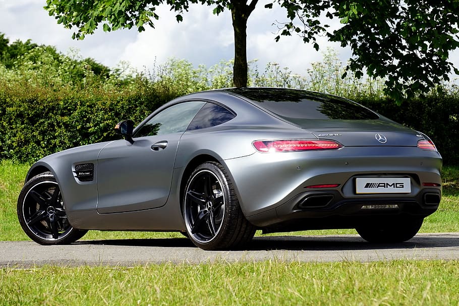 grey Mercedes-Benz coupe parked near tree during daytime, car