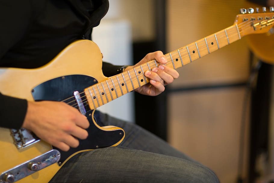 man playing telecaster electric guitar, music, stringed instrument