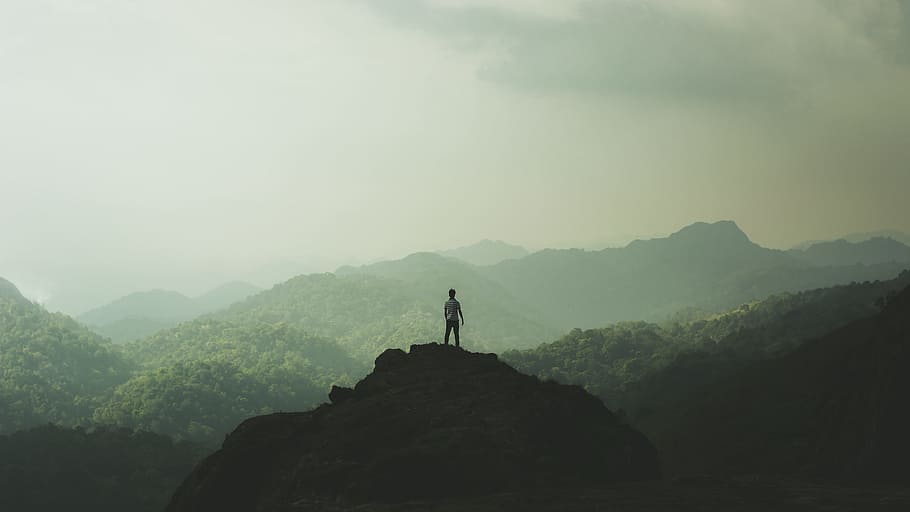 person standing on mountain, person standing at the top of hill HD wallpaper