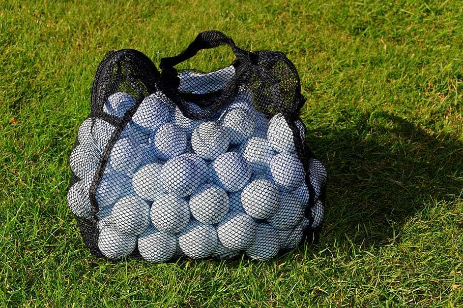 white balls in black mesh bag at daytime, golf balls, practice balls HD wallpaper