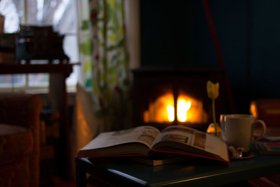 white ceramic mug beside book on brown wooden table, pages HD wallpaper