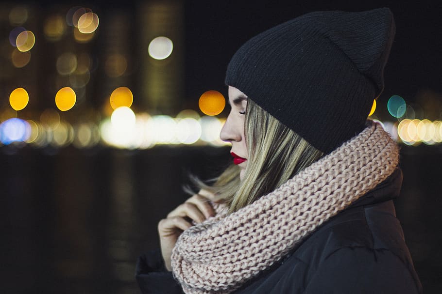 woman wearing black knit cap holding gray lace scarf, dark HD wallpaper