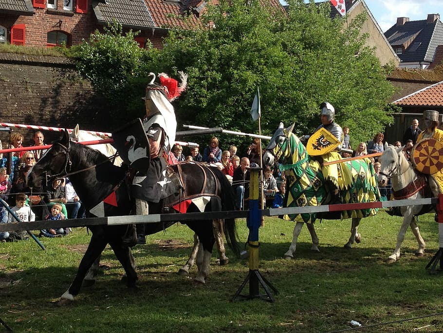 Knight riding on horse at medieval festival, cavalry, jousting HD wallpaper