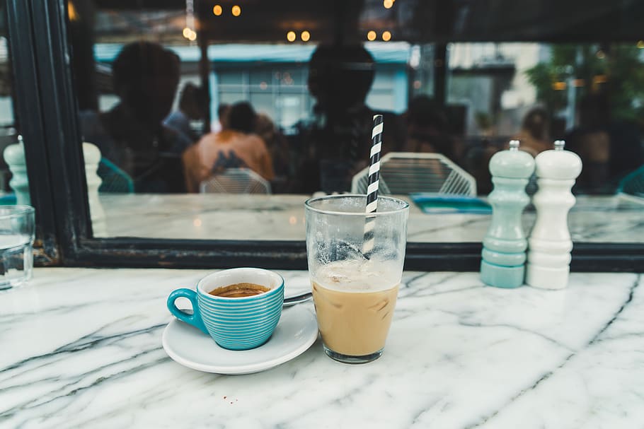 clear pint glass, blue ceramic teacup on white ceramic saucer HD wallpaper