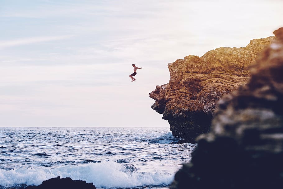 man having a cliff dive, jumped, shore, wide, body, water, sea HD wallpaper
