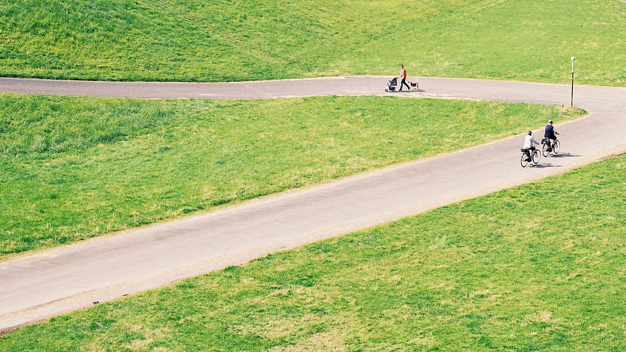 bird's-eye view photography of two bikers on road, bicycles HD wallpaper