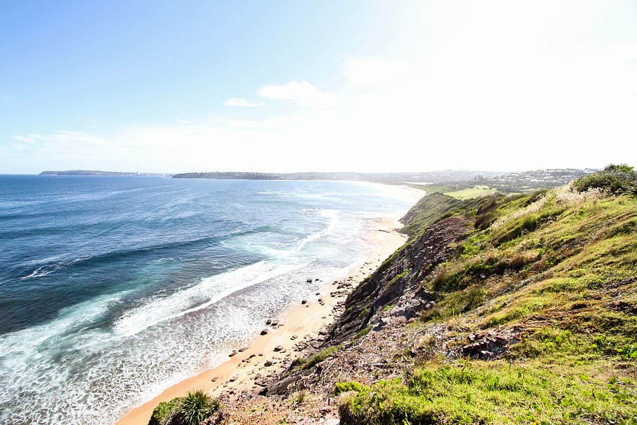 beach, cliff, daylight, grass, high angle shot, island, landscape HD wallpaper