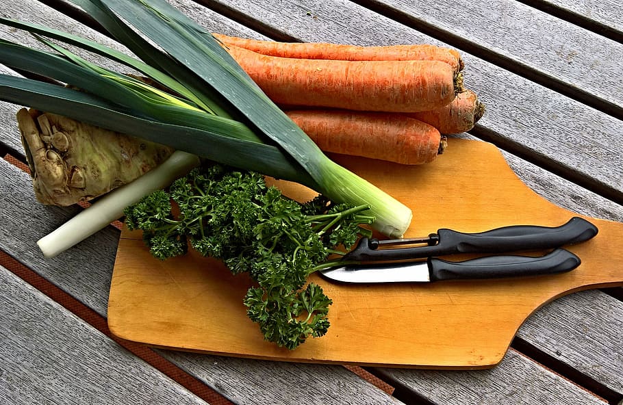 carrots and spring onions with knife on brown chopping board, HD wallpaper