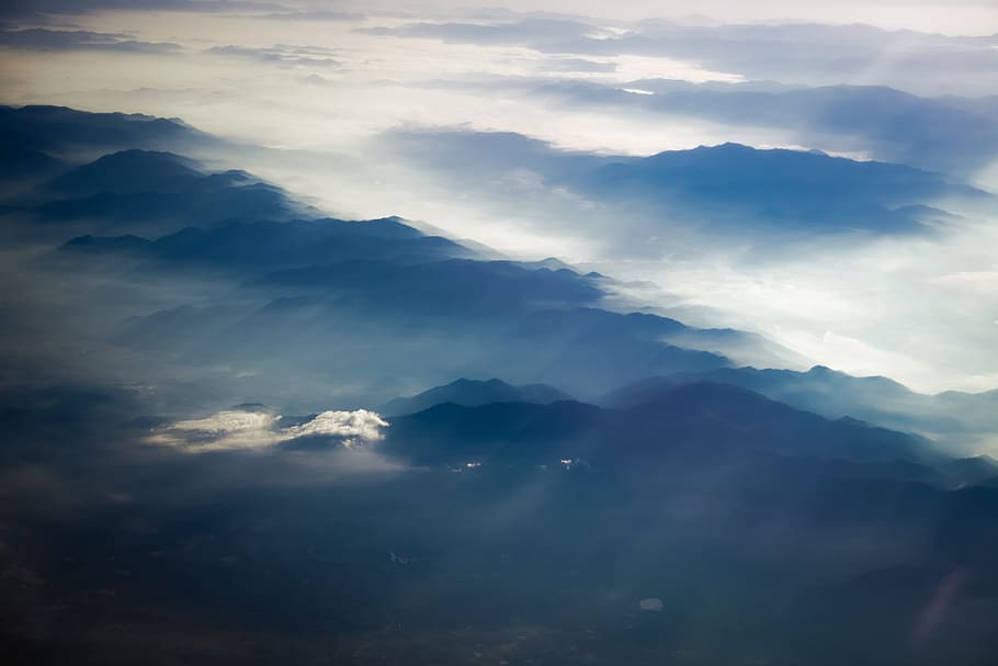 landscape photography of mountains, gray and white clouds at daytime HD wallpaper