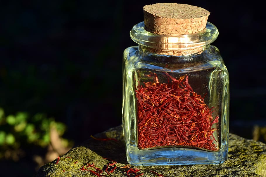 clear glass bottle on rock, saffron, small, spice, red, aroma, HD wallpaper