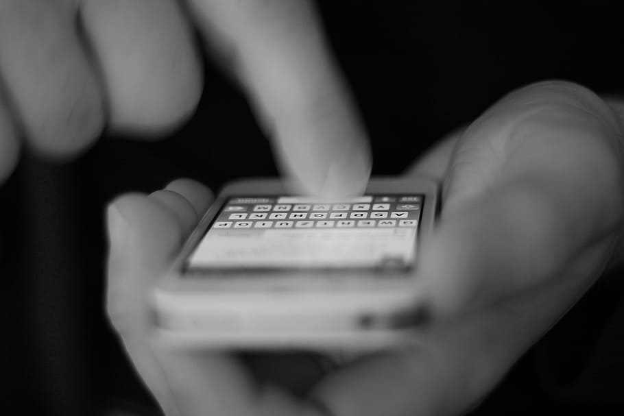 grayscale photograph of person holding white iPhone 4, have a look HD wallpaper