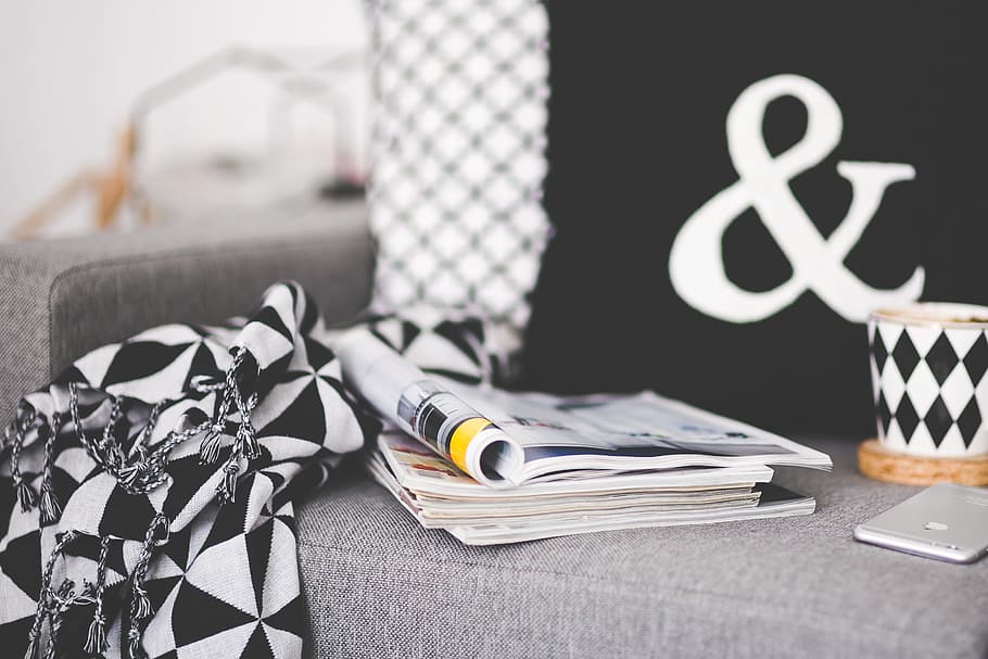 Close of magazines, mug and phone on a couch, apple, coffee, cup HD wallpaper
