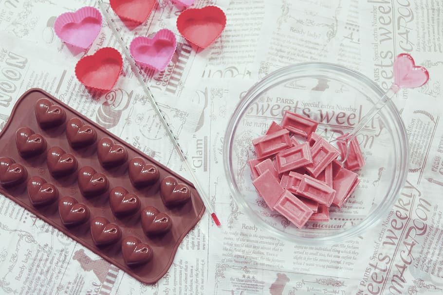 pink chocolate squares on bowl beside heart molding pan, dessert HD wallpaper