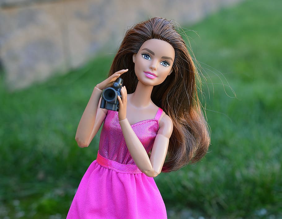 HD wallpaper: close-up photo of Barbie doll holding camera, video camera,  film | Wallpaper Flare