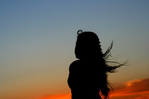 woman staring at sky, sunset, girl, shadow, wind, silhouette HD wallpaper