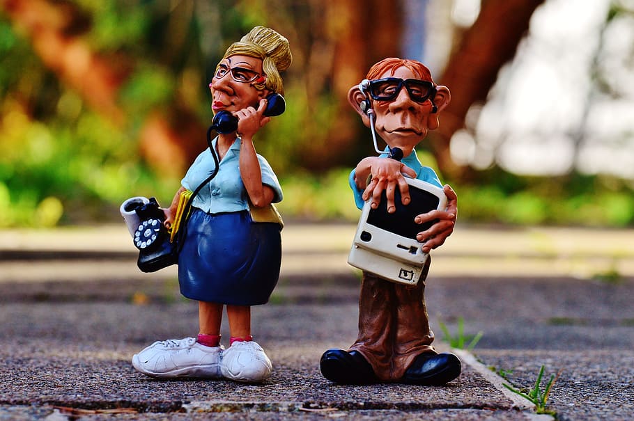 tilt lens photography of two figurines standing on floor, help HD wallpaper