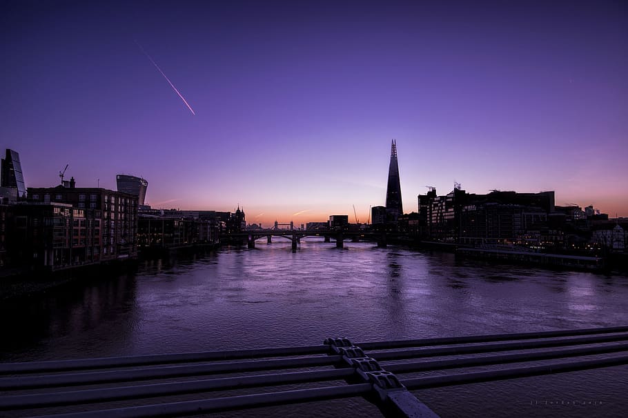 silhouette of buildings beside body of water, silhouette of buildings in landscape photography HD wallpaper