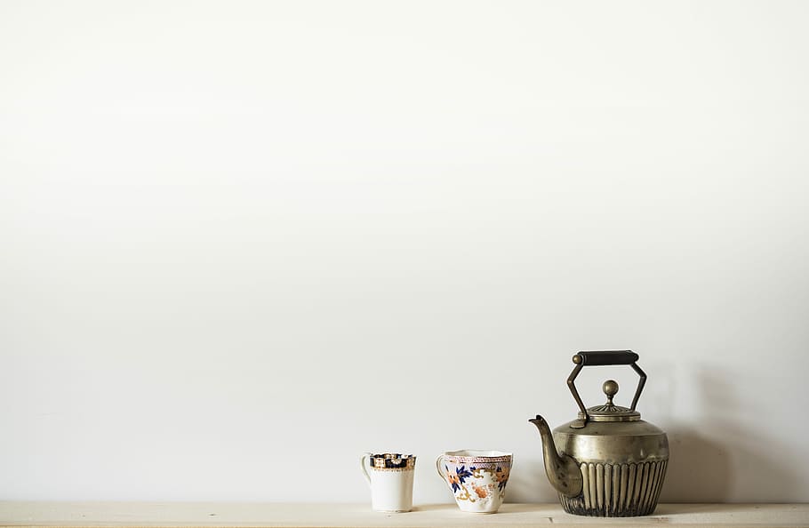 silver kettle beside two mugs, silver teapot beside white ceramic mug on floor HD wallpaper