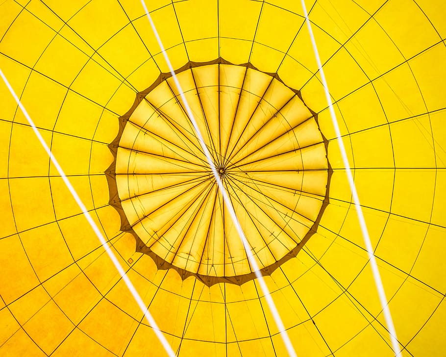 low-angle photography of yellow and black hot air balloon interior HD wallpaper