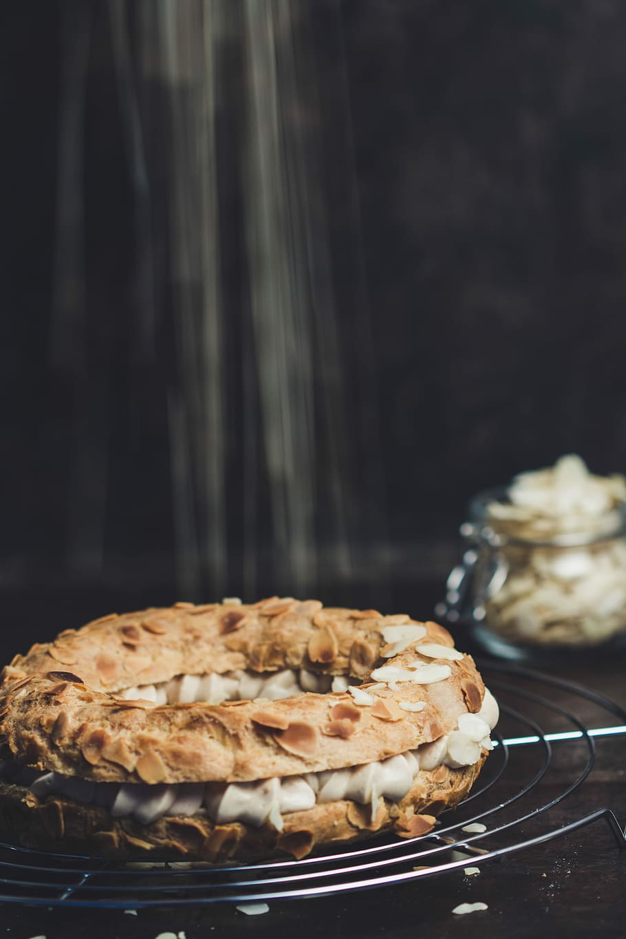 baked pastry on wire stand, baked donut on gray spiral frame HD wallpaper