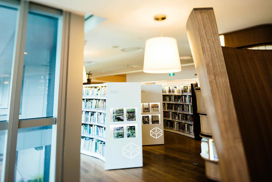 white wooden bookshelves inside room, turned on light inside book store, HD wallpaper