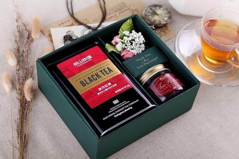 green box beside clear glass tea cup, black tea, tea language HD wallpaper