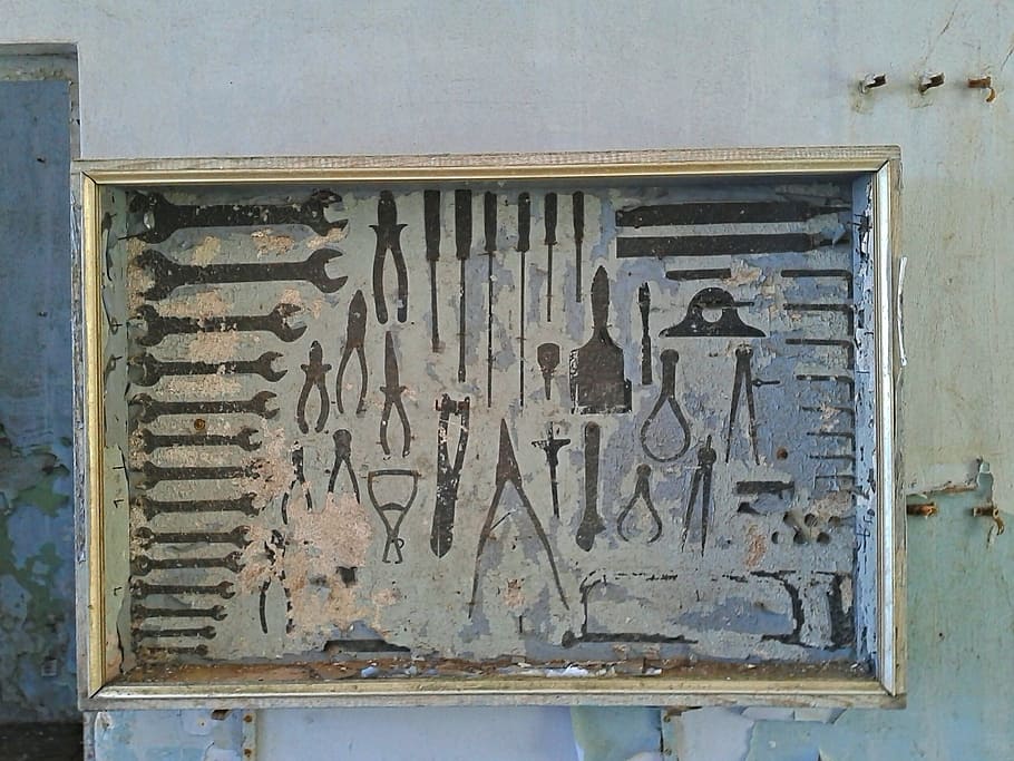handheld tools painting with brown frame on white wall, old HD wallpaper