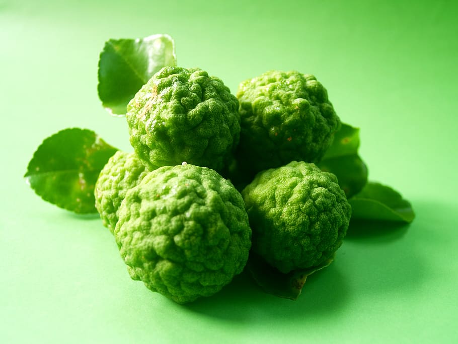 broccoli vegetable on green surface, bergamot, fruit, leaf, isolated, HD wallpaper