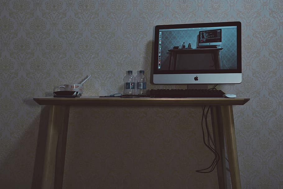 turned on silver iMac on brown wooden table, home, workspace HD wallpaper