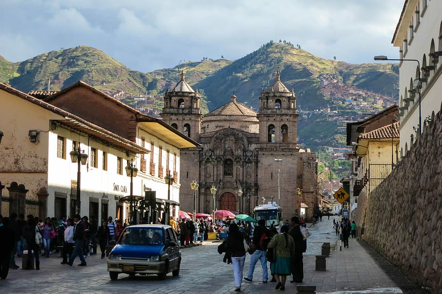 group of people outdoors near cathedral, Cusco, Peru, Streets