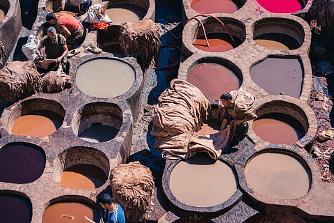 clay dying cointainer, group of men fixing textiles, leather HD wallpaper
