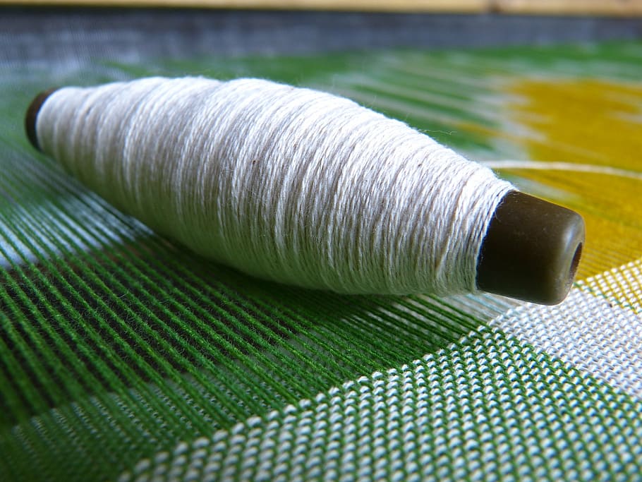 white yard on green texctile, silk, yarn, thread spool, weave HD wallpaper