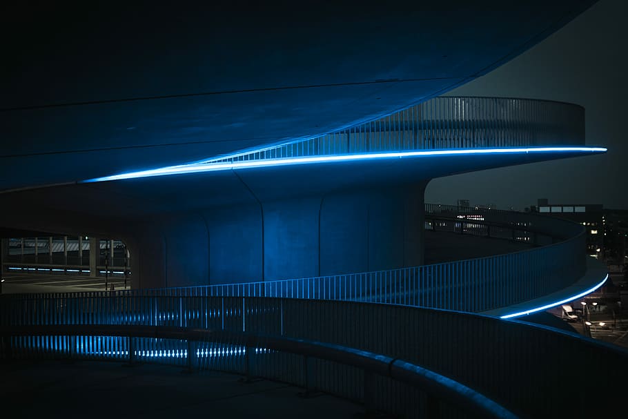 building during night, spiral alley with lighted edge, city, neon HD wallpaper