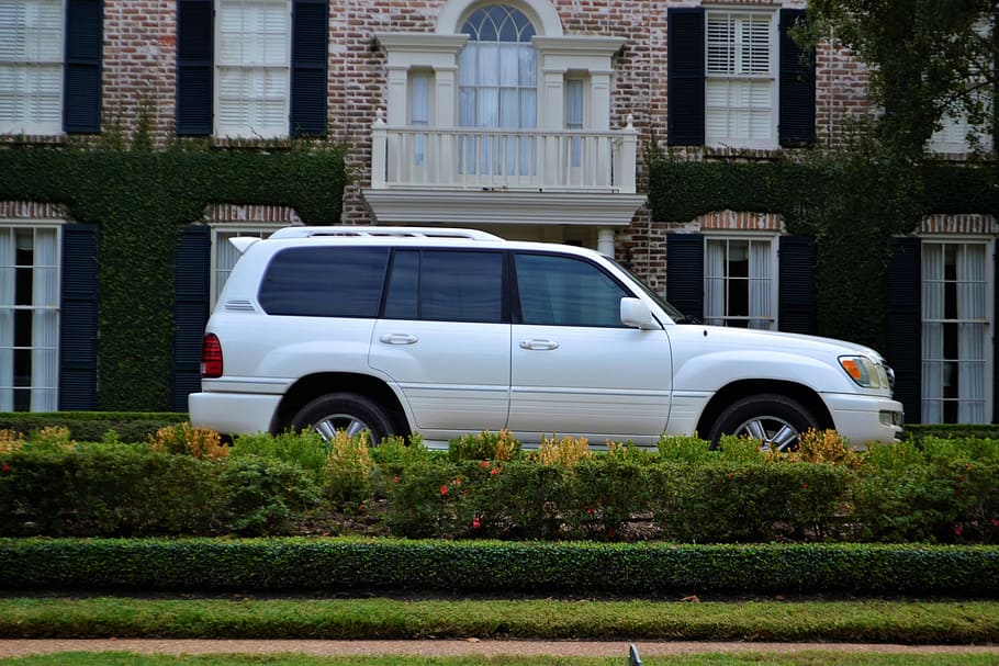 white Toyota Land Cruiser SUV parked near house, 4x4, adventure