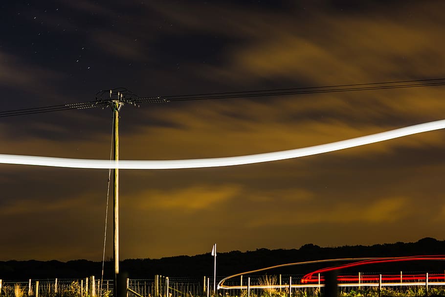 time lapse photography of gray electric post, time-lapse photography of lights at nighttime HD wallpaper