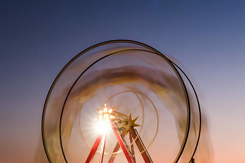 A ferris wheel in Greece's third-largest city, Patras, round hamster wheel with light HD wallpaper