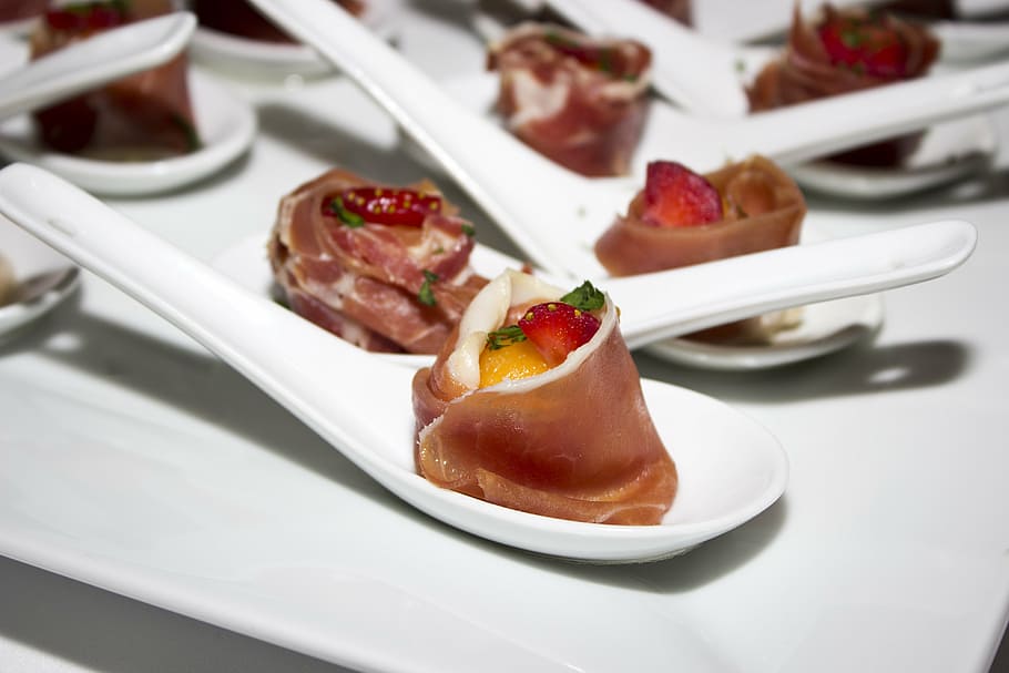 food dishes on white soup spoons, serrano ham, ham with melon HD wallpaper